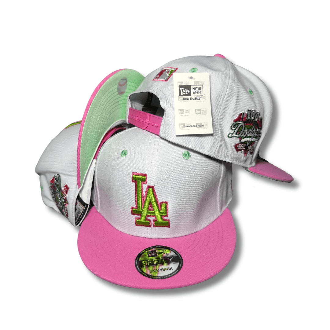 Los Angeles Dodgers New Era 9FIFTY White with Pink Brim and Green Logo Snapback Cap