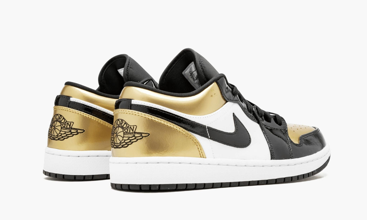 Air Jordan 1 Low "Gold Toe" Sneakers