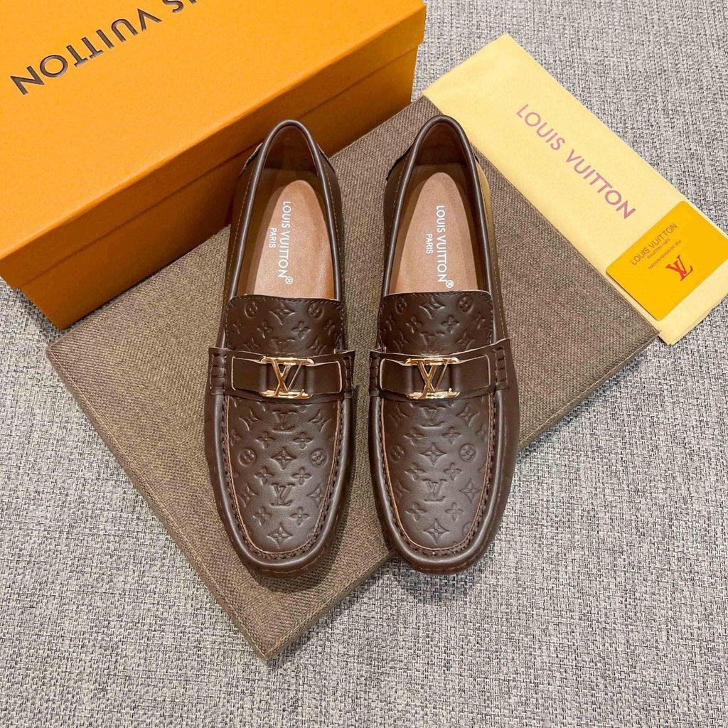 Louis Vuitton Brown Embossed Hardware Loafers — front