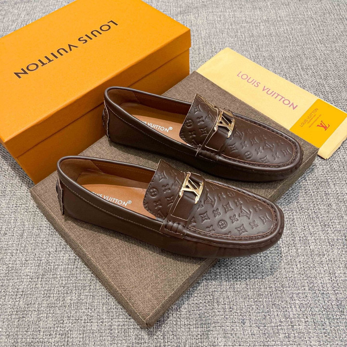 Louis Vuitton Brown Embossed Hardware Loafers — hero