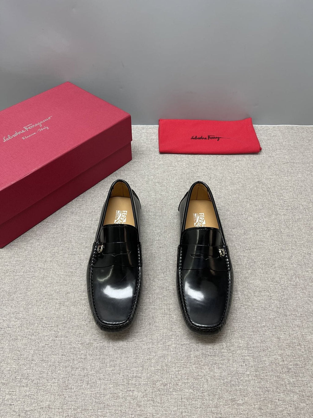 Ferragamo Black Buckle Driving Loafers — front